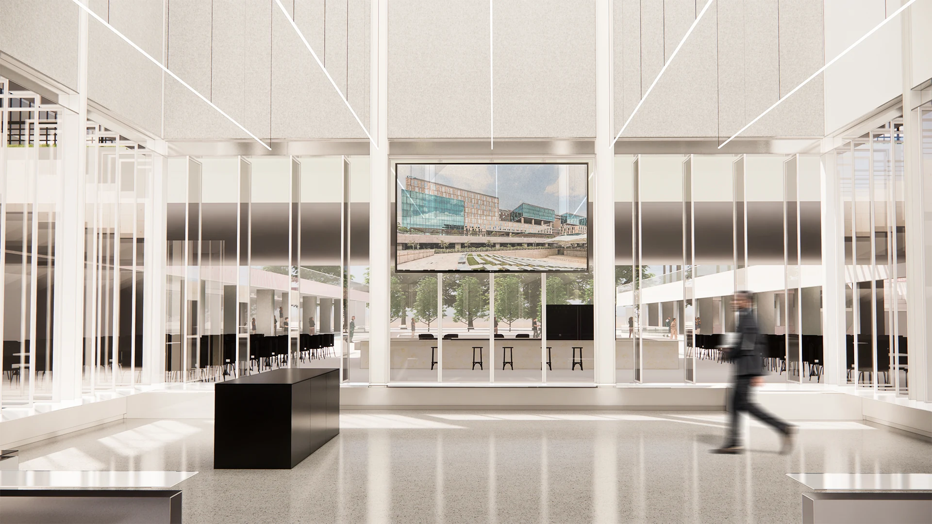 AIRE — a glass, net-zero experience center set among trees in a tech park