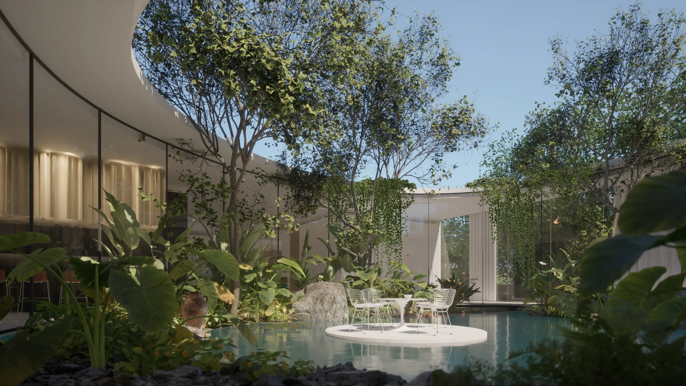 A planted courtyard with a reflecting pool, set within a curved, glazed building