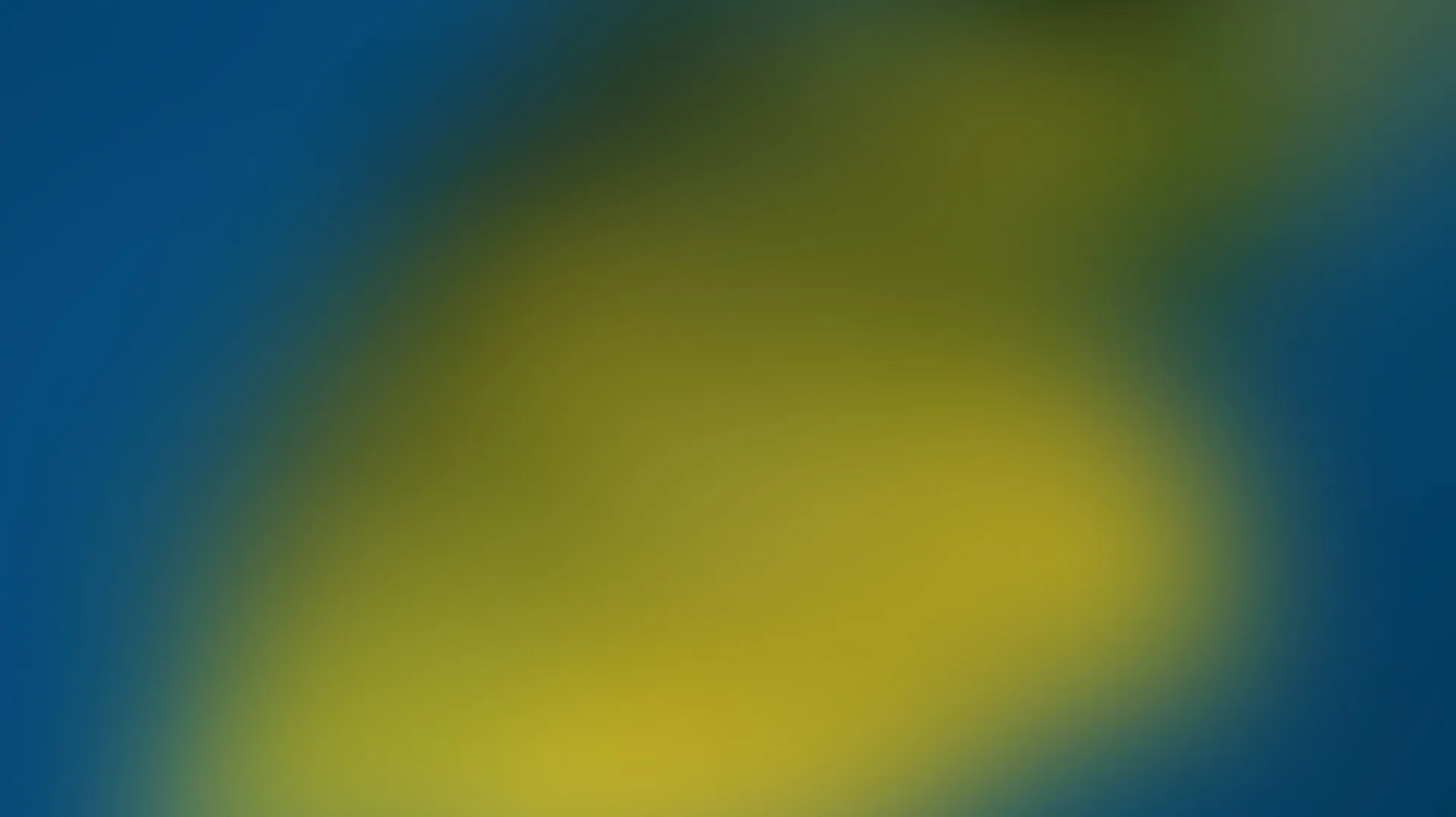 A soft gradient of monsoon blue, mustard and wet green — the brand's colour world