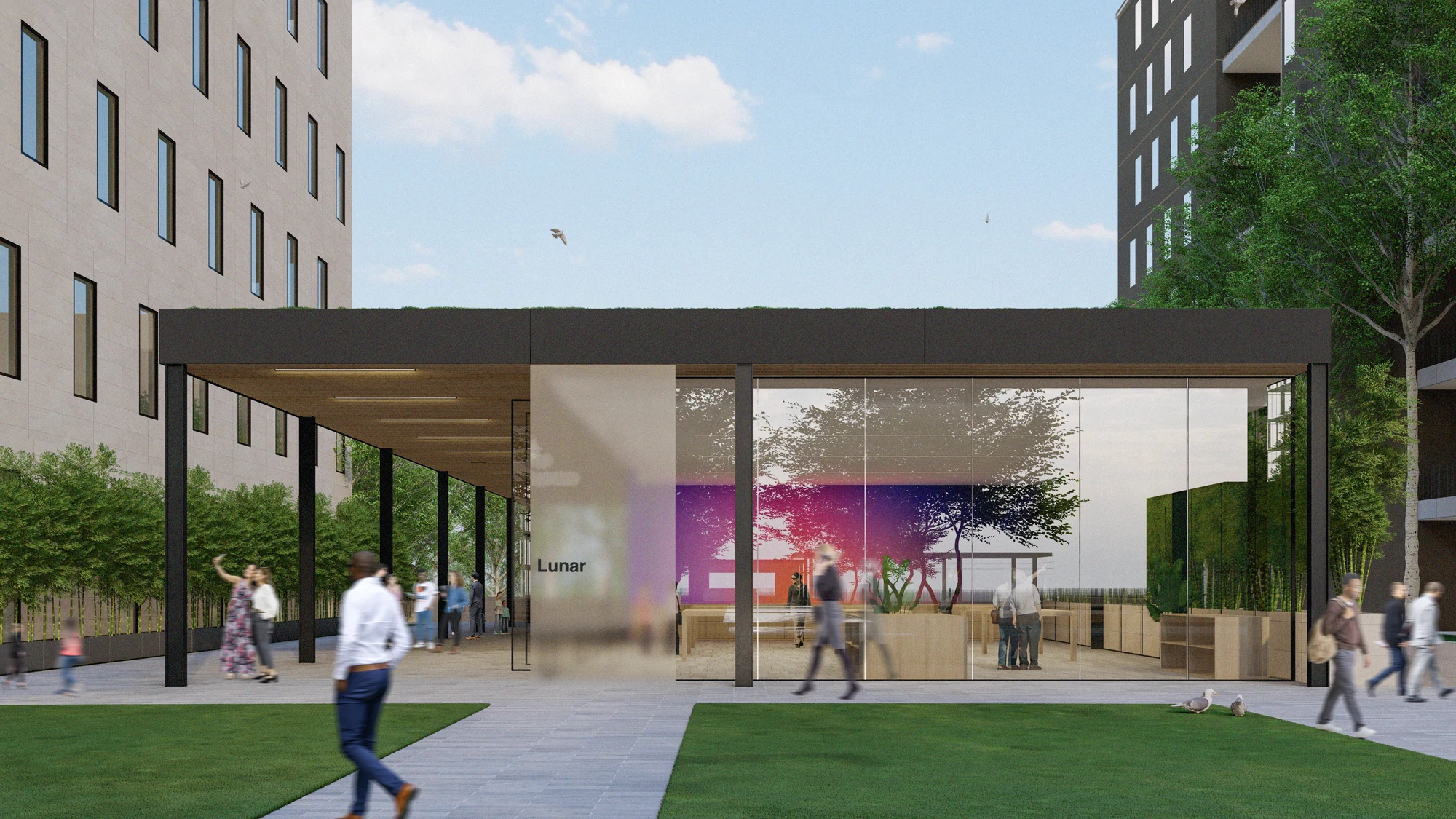A landscaped public plaza between the campus buildings, animated with people beneath a canopy