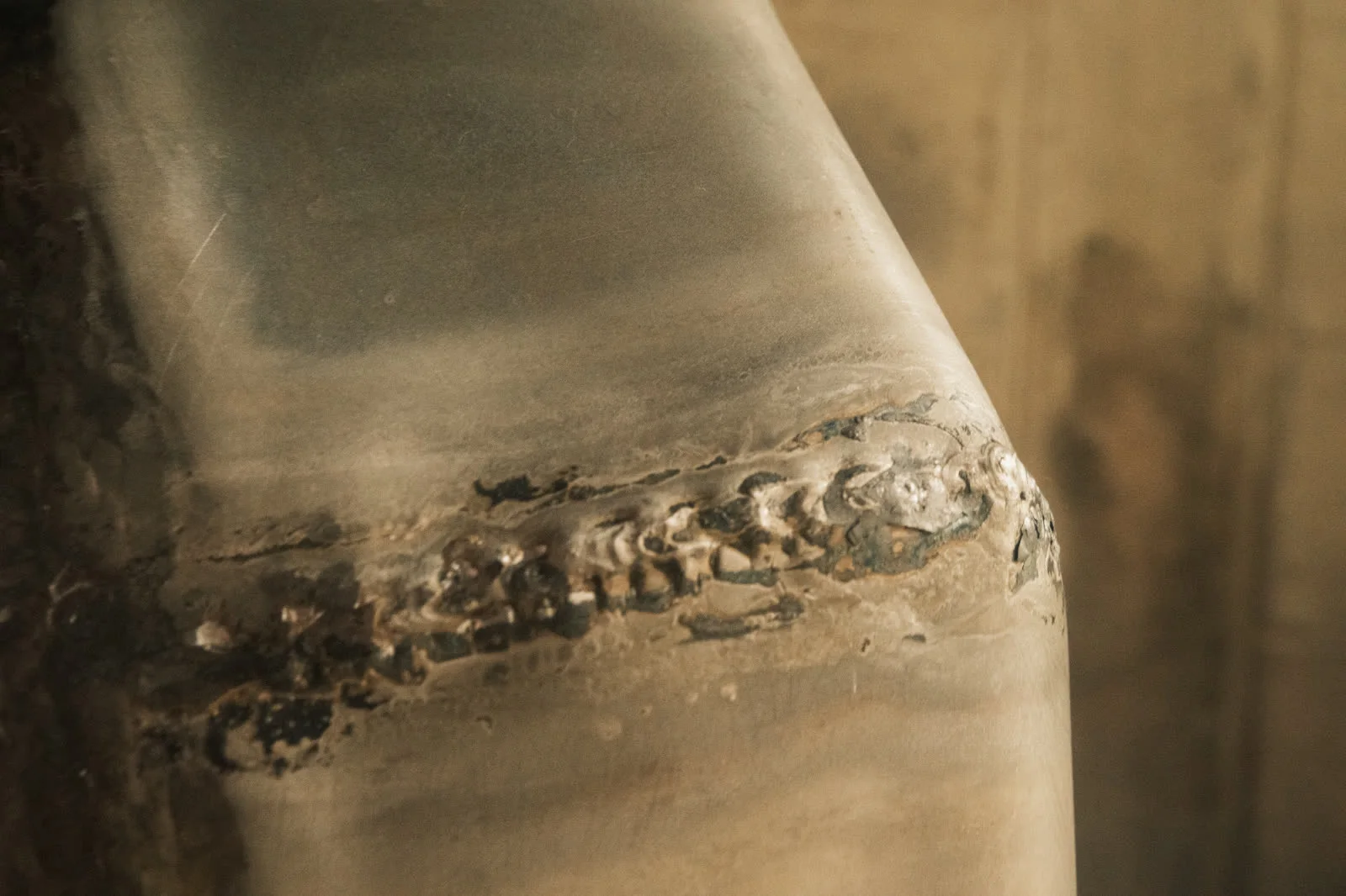 The soldered joints of a bowl, later filed down