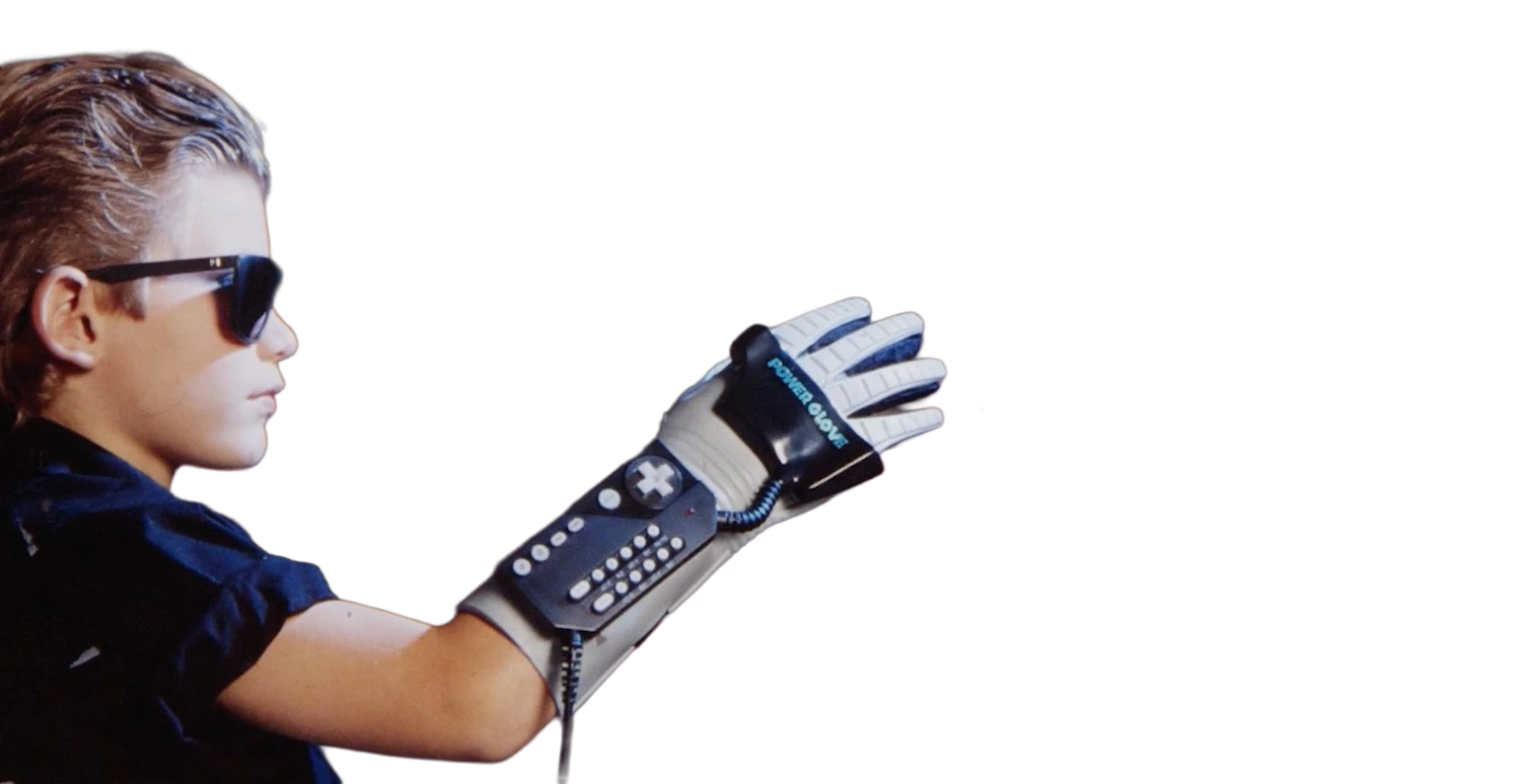 A child wearing a Nintendo Power Glove