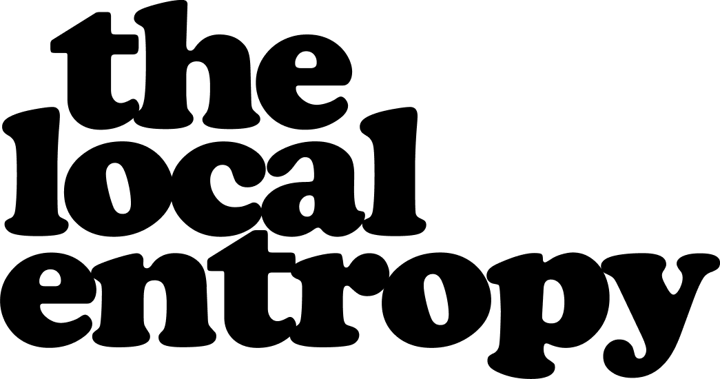 The Local Entropy wordmark, set in stacked, off-kilter Cooper Black