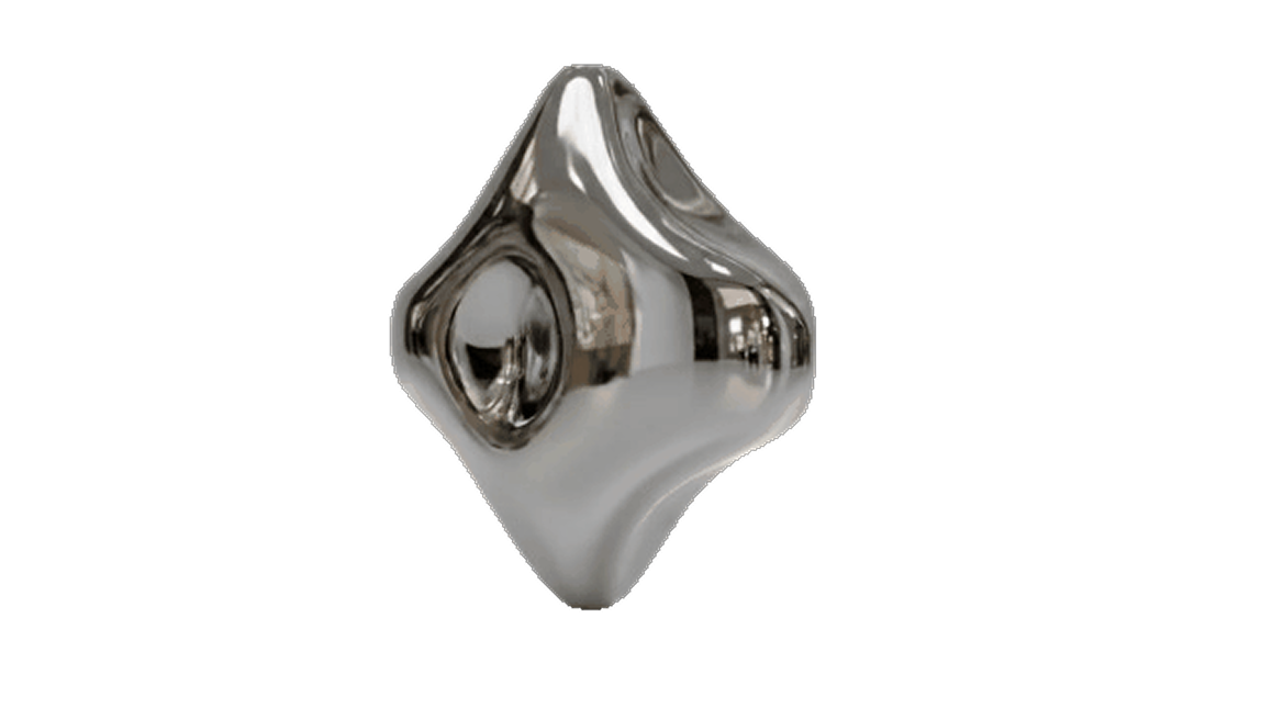 The brand's liquid-chrome ornament, the perfume vessel